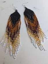 Load image into Gallery viewer, Beaded earrings with a gradient of black, brown, gold, and white on a light background