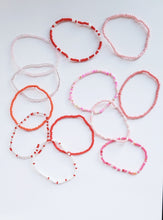Load image into Gallery viewer, Coral and Pink beaded Bohemian elasticized bead bracelet
