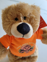 Load image into Gallery viewer, 10&quot; Teddy Bear stuffie with Every Child Matters Tshirt, a Native artist Bill Helin design
