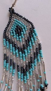 Close up beaded earring North of 50 Fifty