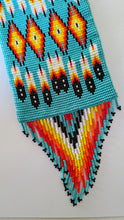 Load image into Gallery viewer, close up of beadwork on cell phone pouch North of Fifty 50
