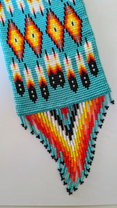 close up of beadwork on cell phone pouch North of Fifty 50