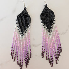 Load image into Gallery viewer, A pair of handmade beaded fringe earrings with a black-to-pink gradient design
