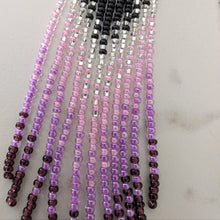 Load image into Gallery viewer, A close-up of Indigenous beaded fringe earrings
