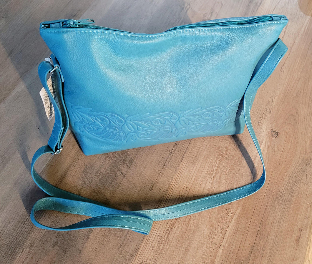 Turquoise shoulder bag with Hummingbird design by Bill Helin